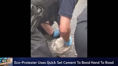 PROTESTS: Protester Uses Quick Set Cement To Bond Hand To Road