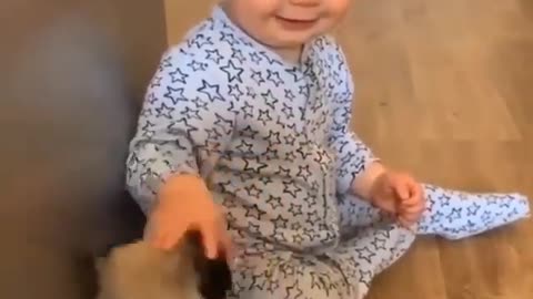 Cute baby and dog