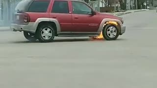 Dude Drives Off in Flaming Vehicle