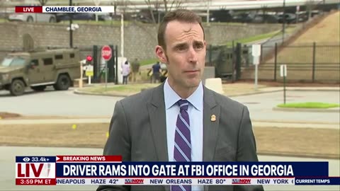 Driver arrested after a car rams gate at FBI office in Atlanta