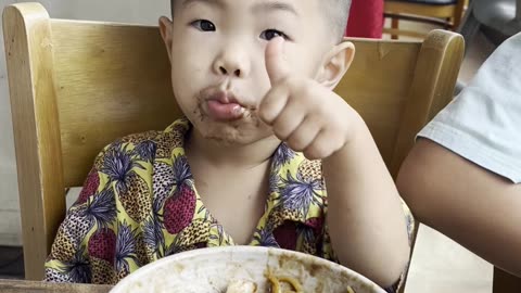 A 4-year-old kid who eats black bean noodles. The best