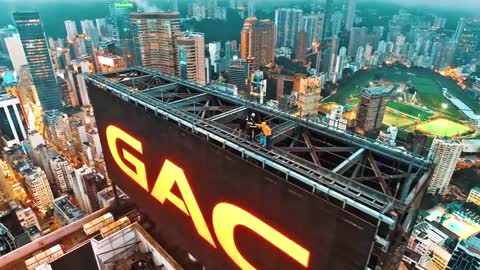 Daredevils hack billboard on top of Hong Kong skyscraper