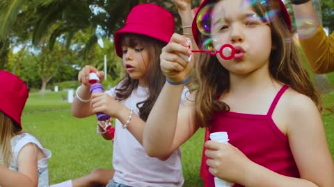 Happy kids music 4K video. Cheerful family enjoying summer outdoor activity