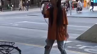 Woman singing in the street