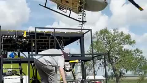 Helicopter lands perfectly on top of truck