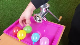 Experiment WATER BALLOONS vs MEAT GRINDER
