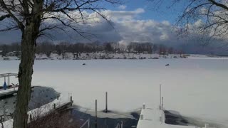 Snowmobiling on the Bay