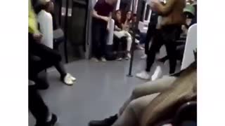 Man in subway uses hand handles to do flip but bumps head