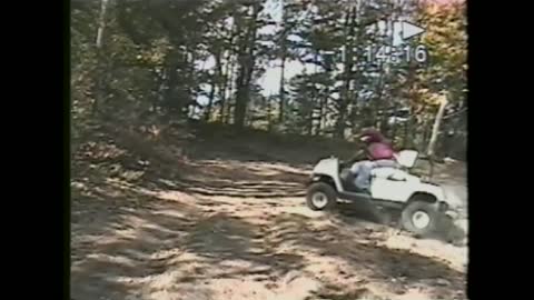 Old Man Launches A Golf Cart Off Of A Hill And Falls Out