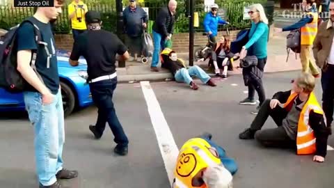 Motorists drag Just Stop Oil protesters off central London road