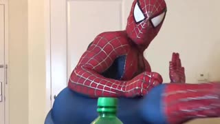 Spider-Man successfully attempts bottle cap challenge