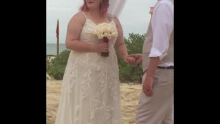 Husband’s Overly Aggressive Wedding Kiss Tackles Wife To The Ground