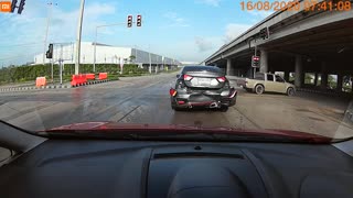 Driver Parked at Red Light Gets Rear Ended into Another Car