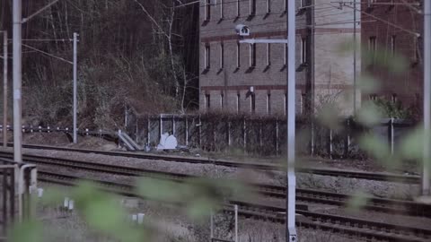 rail train passing on the road