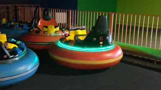 Spencer driving bumper cars at @Play VID_20180422_135143