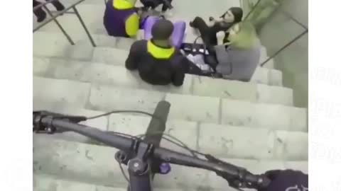 down the stairs by bike, over everything and everyone