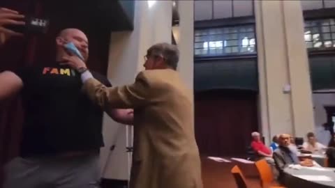 Guy tries to stop an anti-Pfizer heckler and gets his ring knocked off🍿🍿🍿