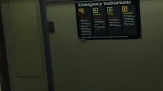 Butterfly on emergency sign on subway