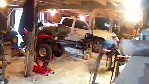 Psycho Squirrel Randomly Attacks Guy's Face In His Garage