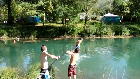 Slackline water stunt ends with epic faceplant