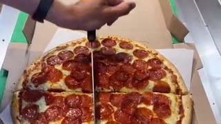 This Pizza-Cutting Life Hack Is the Perfect Crime