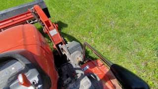 How difficult is it to install a belly mower on a subcompact tractor?