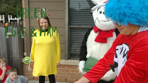 See this mascot party character hat cat plays the green Eggs and ham game