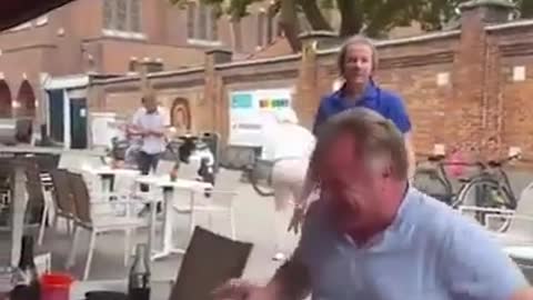 Two drunk men fight