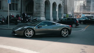 Ferrari drives around the city