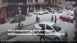 Pedestrian narrowly avoids being hit by out-of-control car.