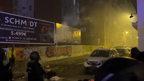 Spanish riot police firing tear gas and rubber bullets against protesters tonight