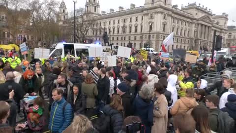 Chants of "Arrest Boris Johnson" as protesters gather outside parliament