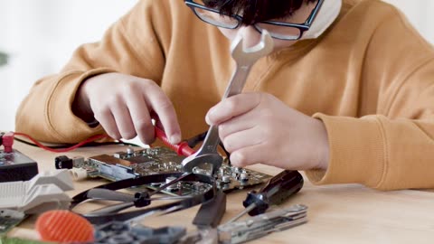 HD : kids working on electronics by ahsaan yaseen