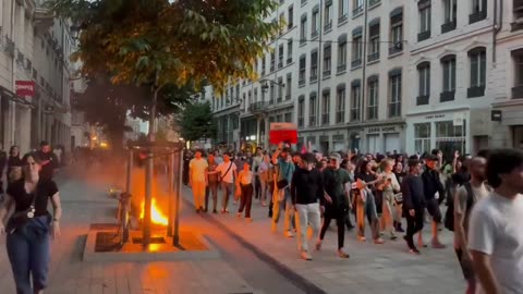 FRANCE - Lyon: Anti democracy protesters take to the streets, setting fire to benches