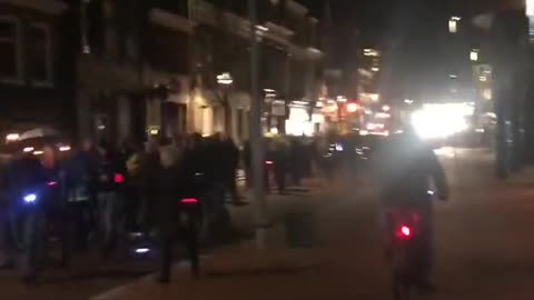 Farmers tractors leading the Dutch on torchlit protest against vaccine passports mandates.