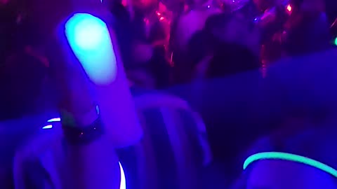 twirling light baton on New Year's Eve at Numbers Nightclub in Houston, Texas