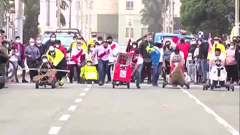 Recycled 'crazy cars' race through Lima