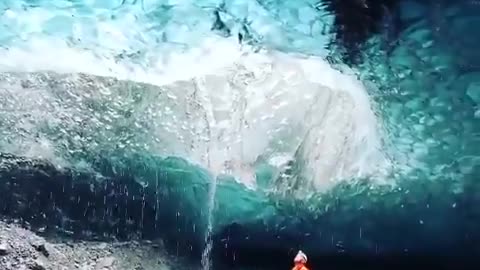 Water flowing beneath glaciers can create spectacular ice caves.