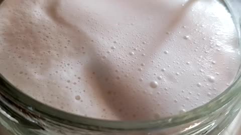 Making almond milk. Non-dairy milkshake