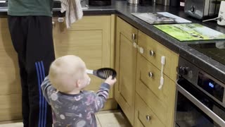 Childproofing Can't Stop Two-Year-Old From Helping in the Kitchen