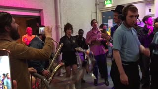 Arcade Fire play an impromptu jam for fans in venue lobby