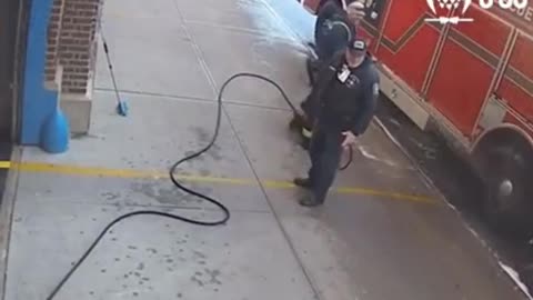 Woman solves a problem (walking over a hose)