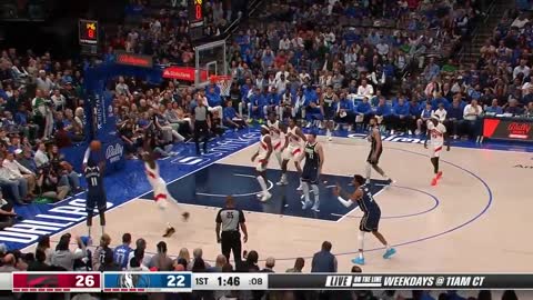 Luka Doncic splits the defense with a spin and finds Tim Hardaway Jr. for the corner-3 🤯