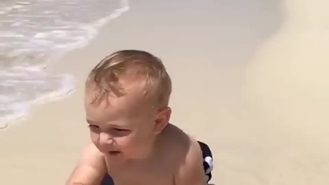 Funny baby reaction on the beach😍😍