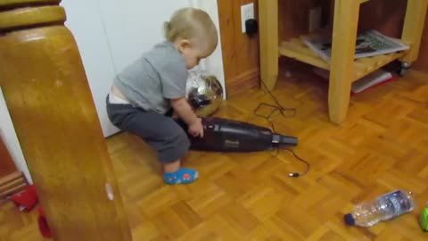 Baby Plays with Dustbuster, freak out When Its Turn On look at his reaction