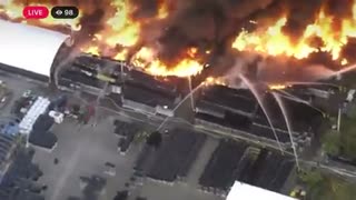 Massive 5 acre fire has broken out a warehouse storing plastic plant pots in Kissimmee, Florida.