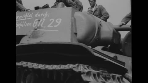 german_troops_inspect_a_soviet_kv1_heavy_tank
