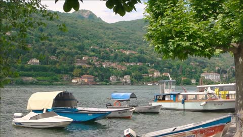 lake maggiore moored boats piedmont town summer in italy