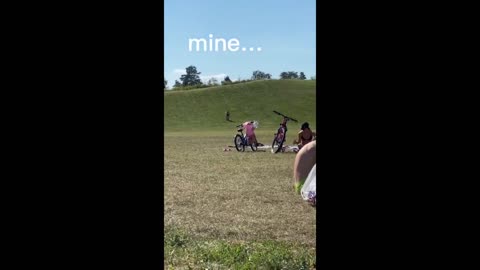 Fearless kid rides bike down hill, totally wipes out