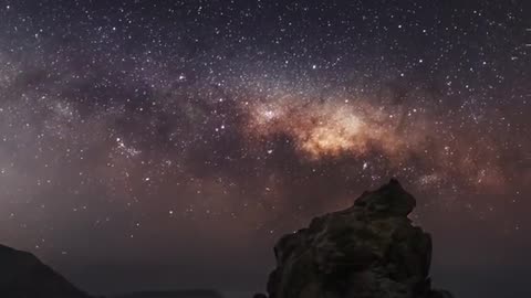 The milkey way setting over the coast of New Zealand